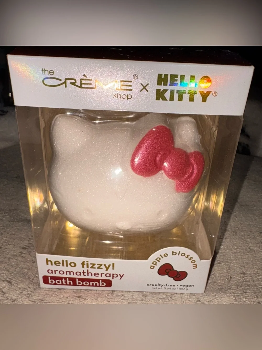The Crème Shop x Hello Kitty Fizzy Apple Blossom Bath Bomb - White with Red Bow